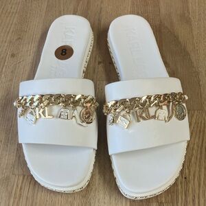 Karl Lagerfeld Ivory Slide Sandals with Gold Charm Chain